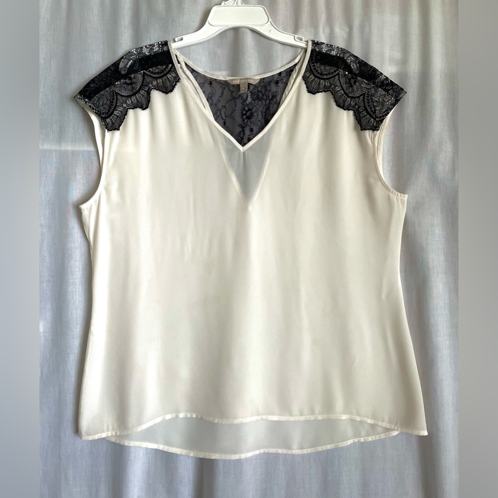 Banana Republic women’s blouse. Cream color polyester black lace accent. Size XL